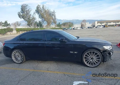 2015 BMW 750Li z USA, uszkodzony, nr VIN WBAYE8C55FD782112